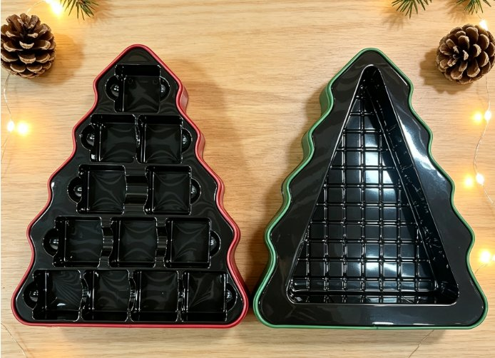 Christmas tree-shaped tin cans